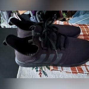 Adidas tennis shoes size 11 . Only wore a handful of times.